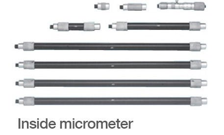 Several inside micrometers of differing lengths.