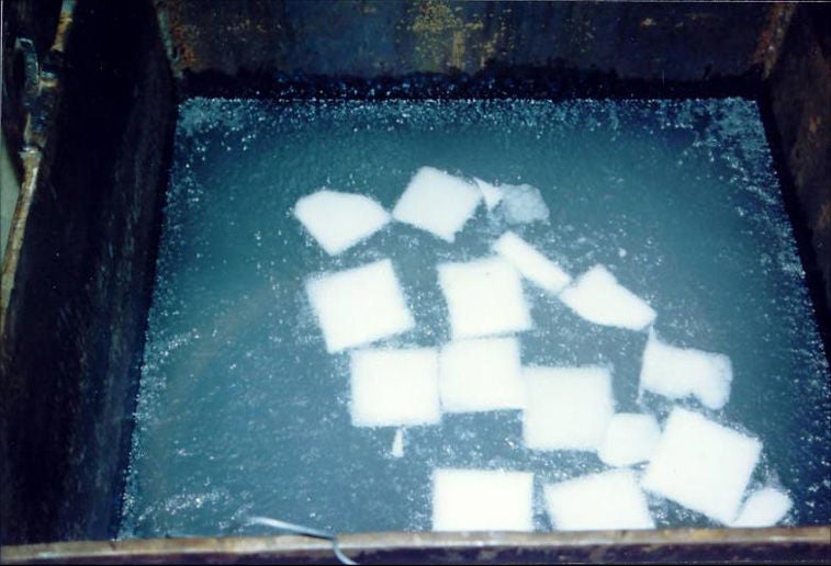 Pool of dry ice for cool fitting.