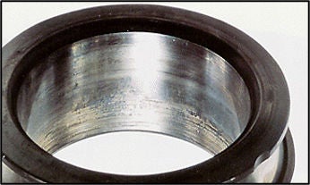 Inner ring creep and associated scoring damage.